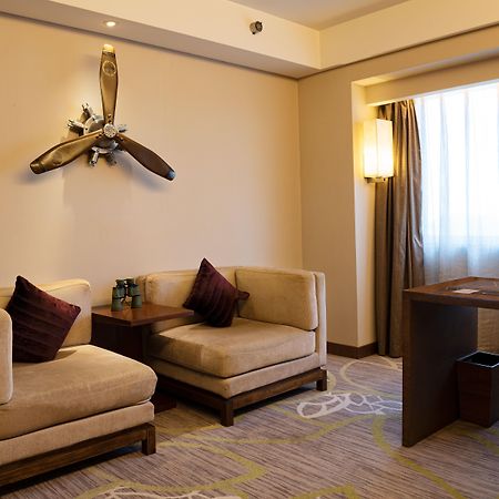 ホテル クラウンプラザ広州 シティ センター エクステリア 写真 A suite at the hotel