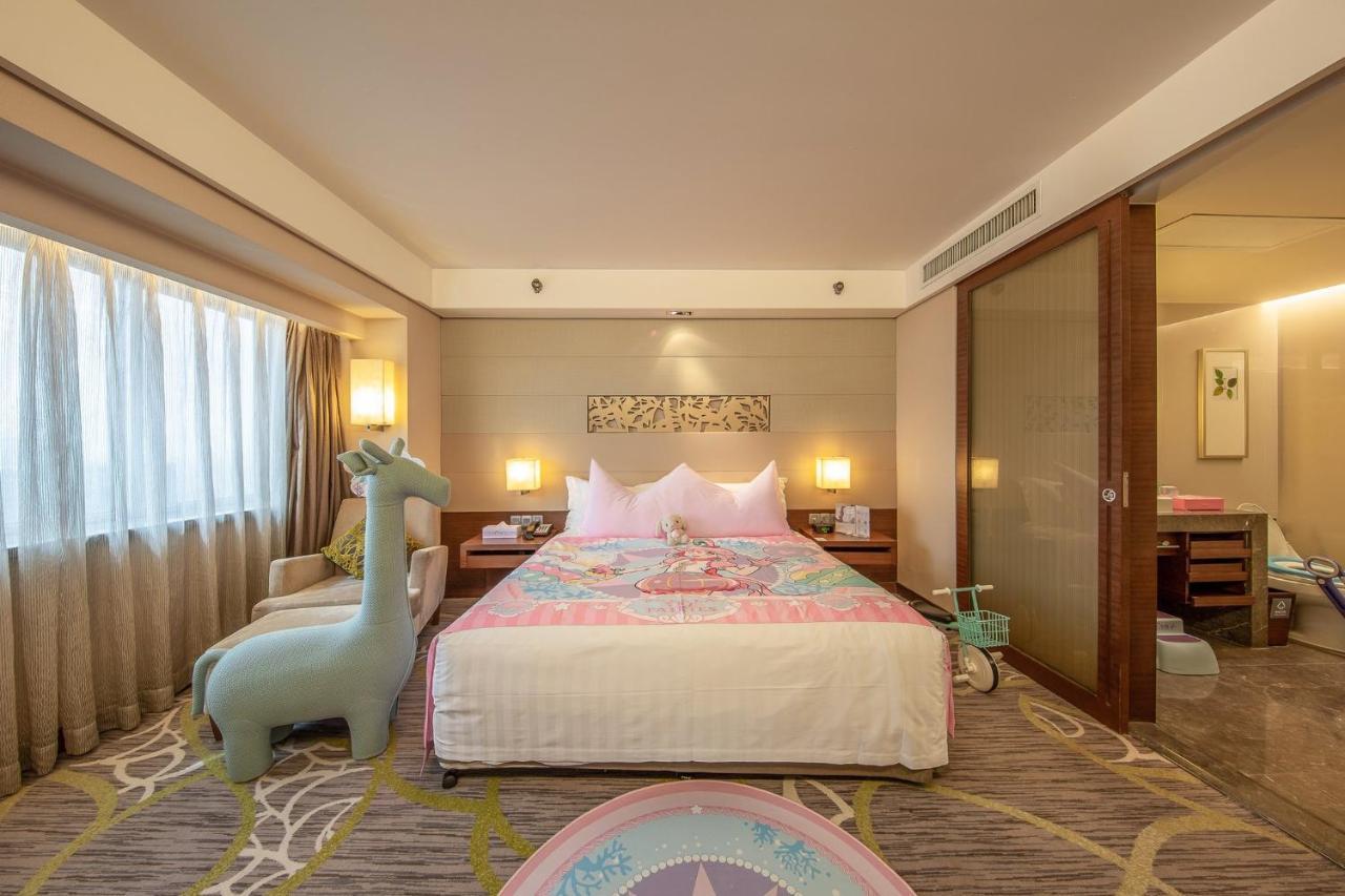 ホテル クラウンプラザ広州 シティ センター エクステリア 写真 A bedroom at the hotel